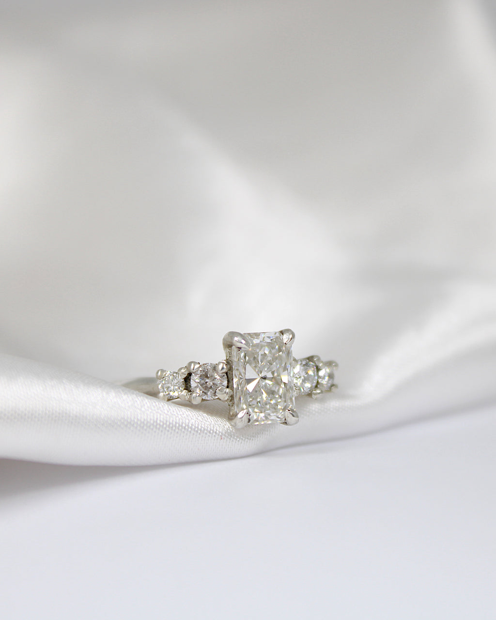 Amy | Hannah McDanielson Jewellery - Radiant cut lab diamond five stone tapered ring