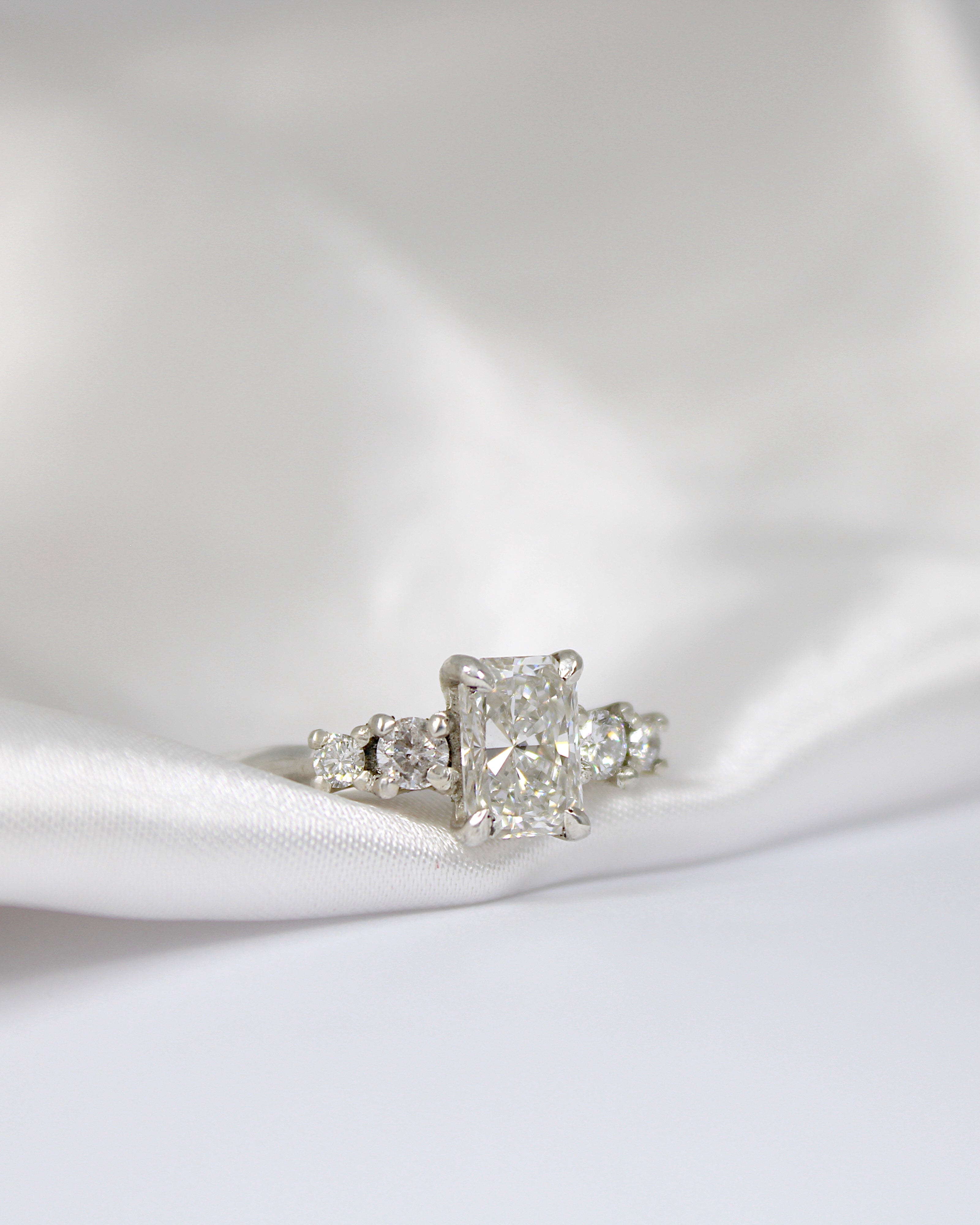 Amy | Hannah McDanielson Jewellery - Radiant cut lab diamond five stone tapered ring